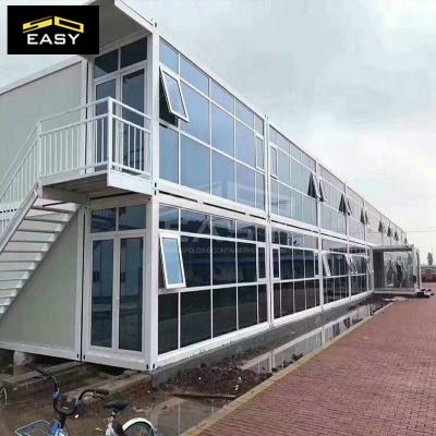 2 floor luxurious glass house by flat pack container office